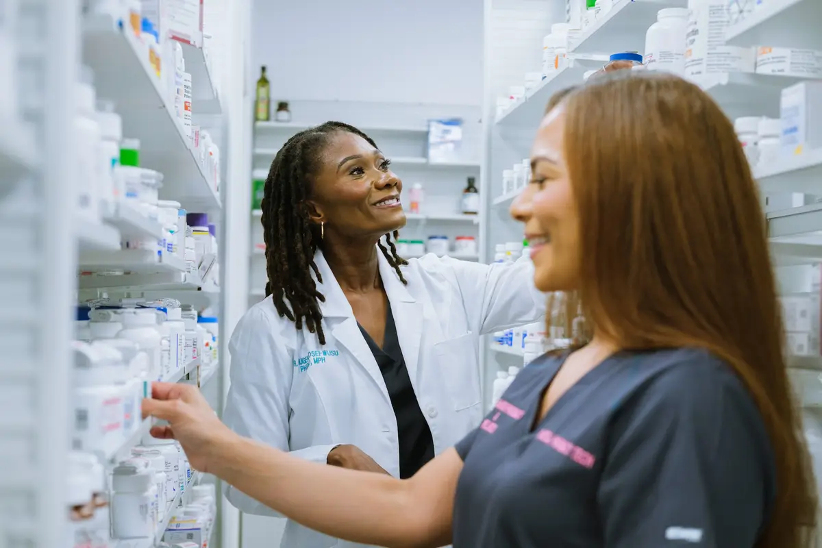 Pharmacist helping a patient choose over-the-counter products