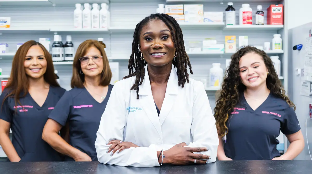 Dr. Eugenia Osei-Wusu and the pharmacy team at the counter